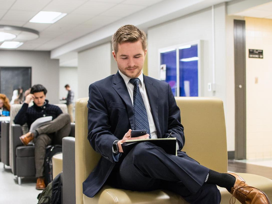 Male student sitting in Kettler